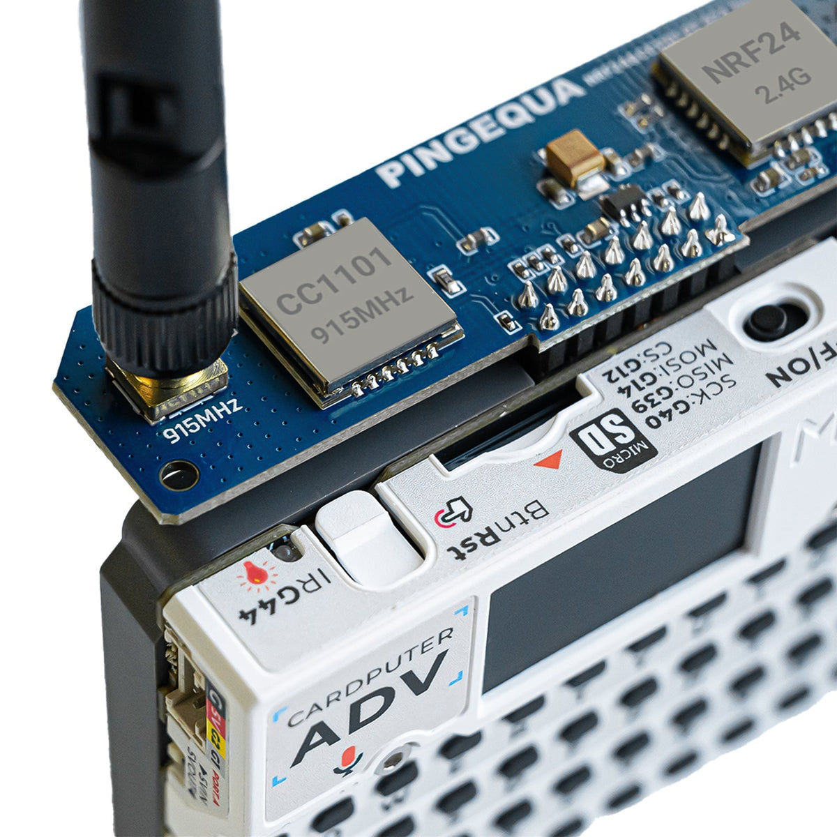 Close-up of the CC1101 can and SMA on a Hydra board seated on Cardputer ADV