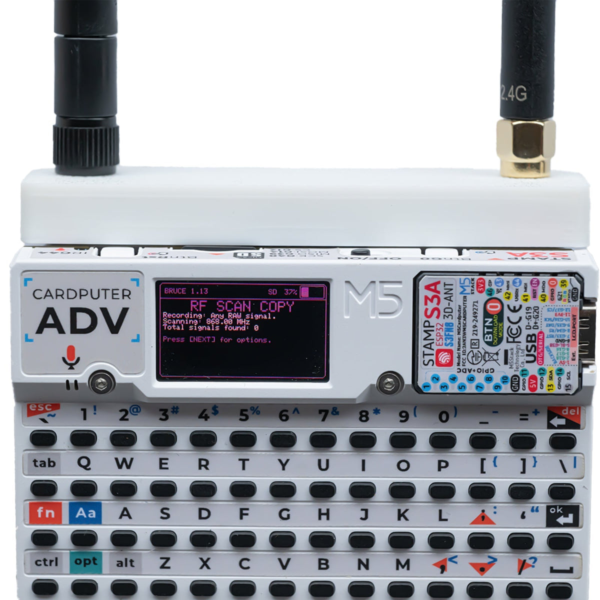 White Hydra case on Cardputer ADV; RF SCAN COPY text on the Bruce screen