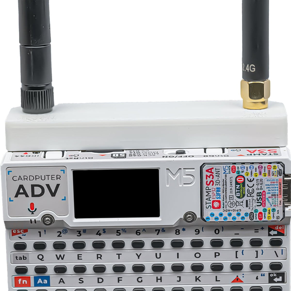 Front view of Cardputer ADV wearing the white Hydra case and two antennas, screen off