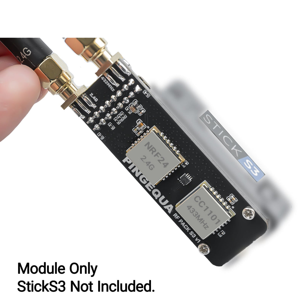 Hand holding RF Pack S3 on a StickS3, chips and SMA connectors in focus